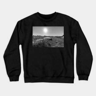 Rowing boats on the river bank in Thurne, Norfolk Crewneck Sweatshirt